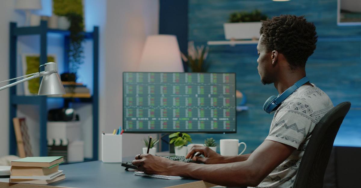 person working with stock market finance computer broker looking data charts with crypto currency financial exchange global investment entrepreneur analyzing trade value 1