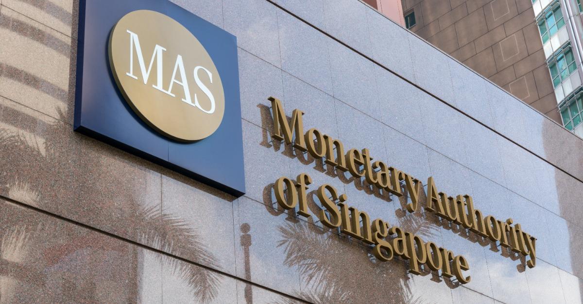 Monetary Authority of Singapore MAS logo signage on the building at entrance. 123rf