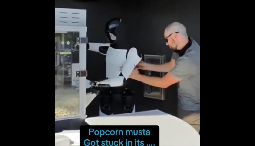 特斯拉Optimus機器人首秀故障!裝爆米花「卡關」、遠端操控仍失靈 1 特斯拉Optimus機器人在新餐廳首秀故障,於裝爆米花時「卡關」,顯現人類遠端操控仍會失靈。